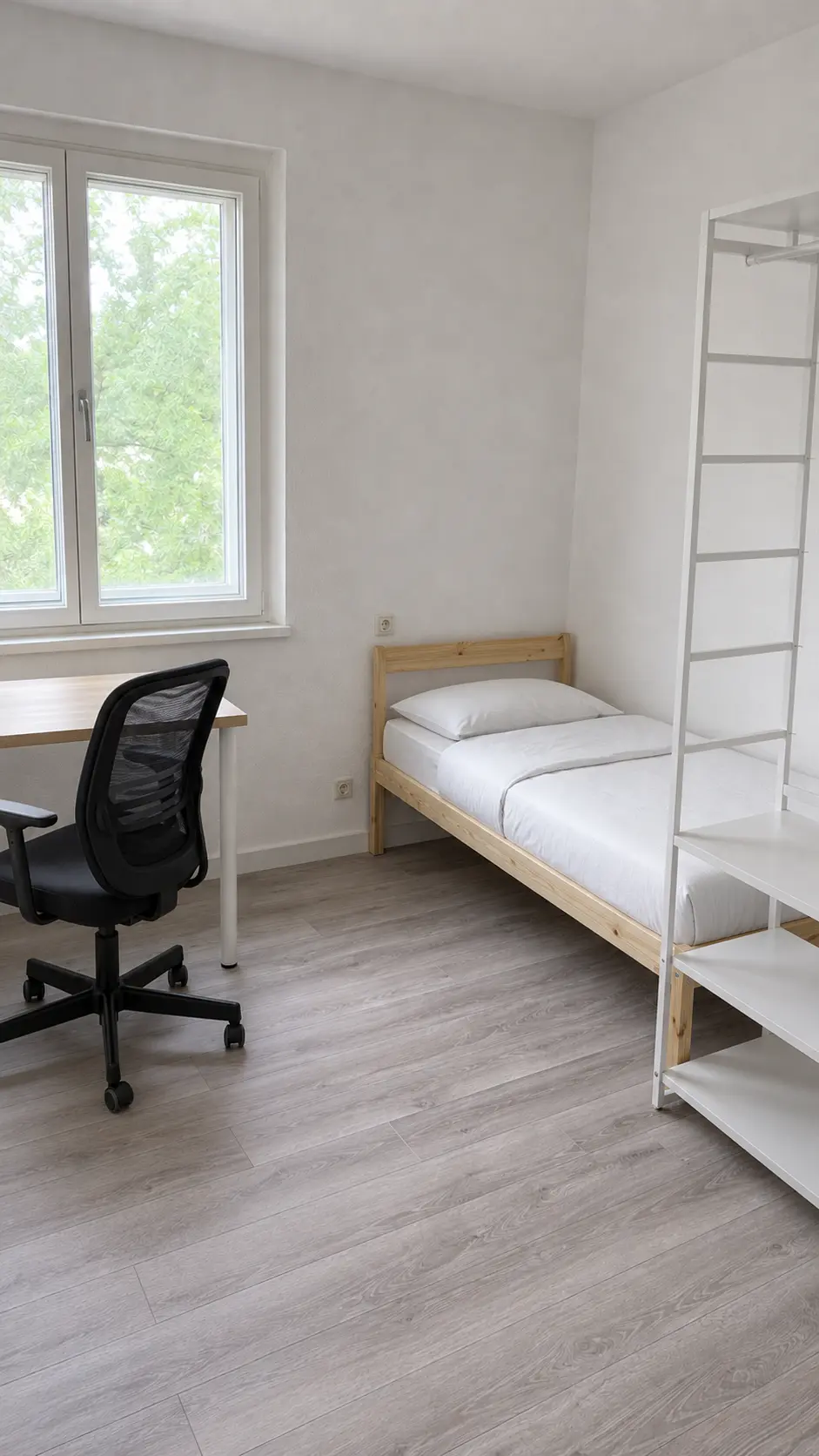Beispielhaft möbliertes WG-Zimmer mit Bett, Schrank, Schreibtisch und Stuhl